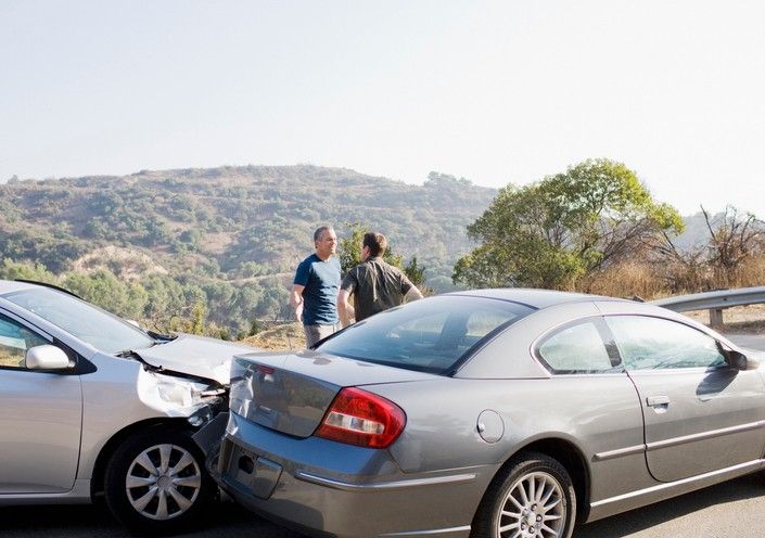 Rear-end collision in Phoenix, AZ, featuring two cars with visible damage